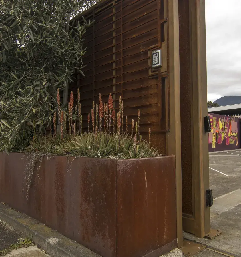 Custom corten planter boxes and matching gate