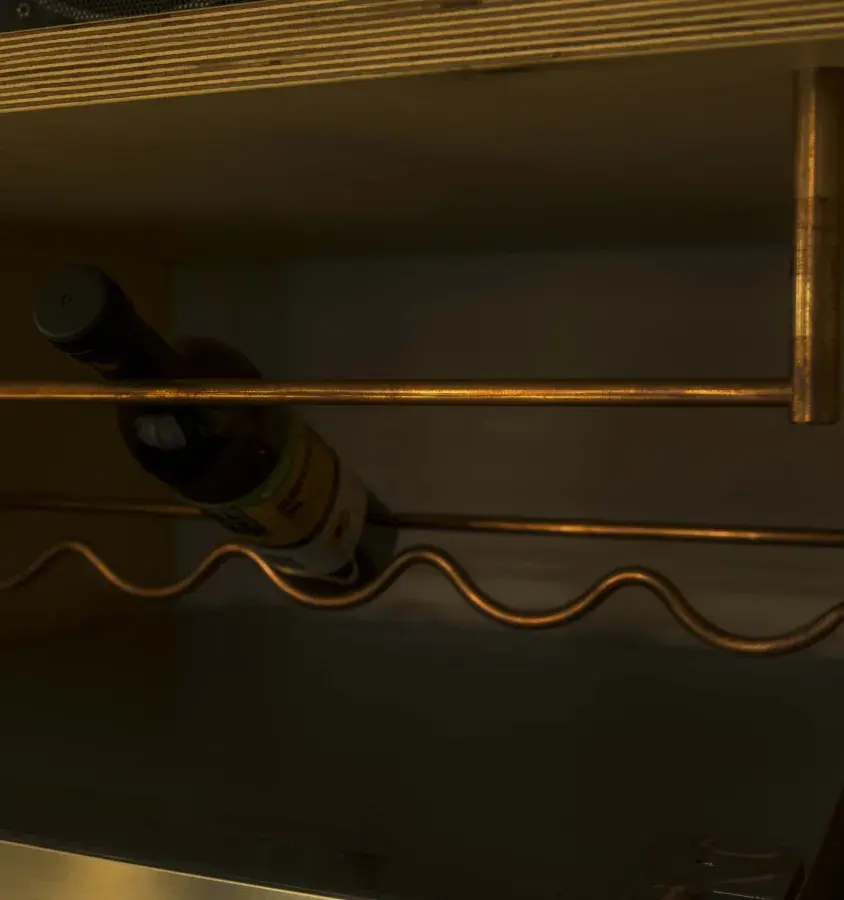 Custom bent copper wine racks 